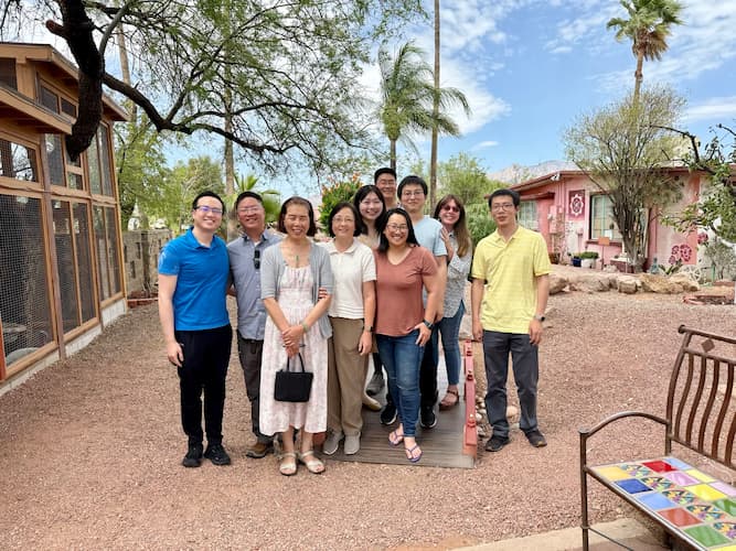 People practicing the Falun Dafa exercises together outdoors