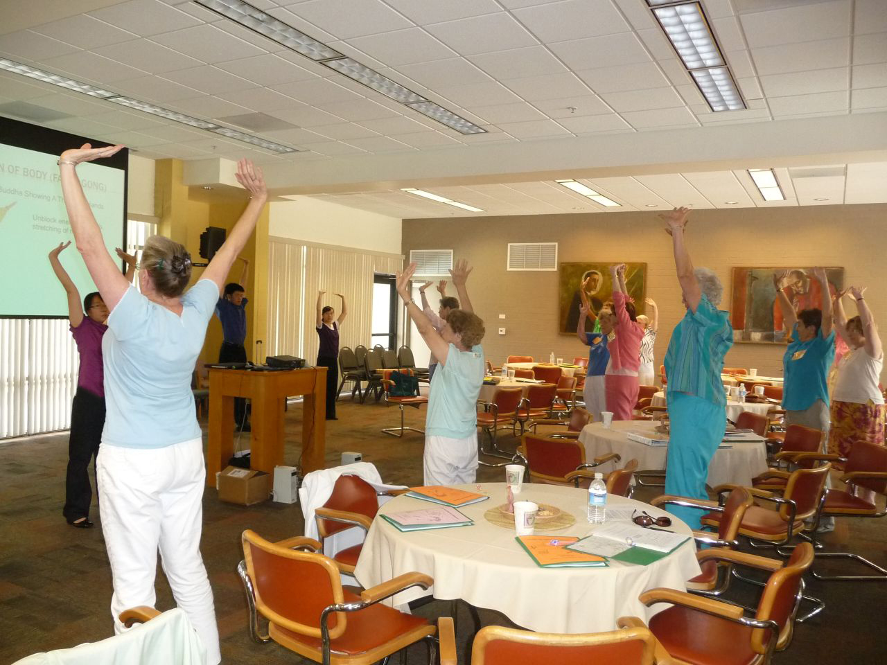 Volunteers and newcomers practicing together