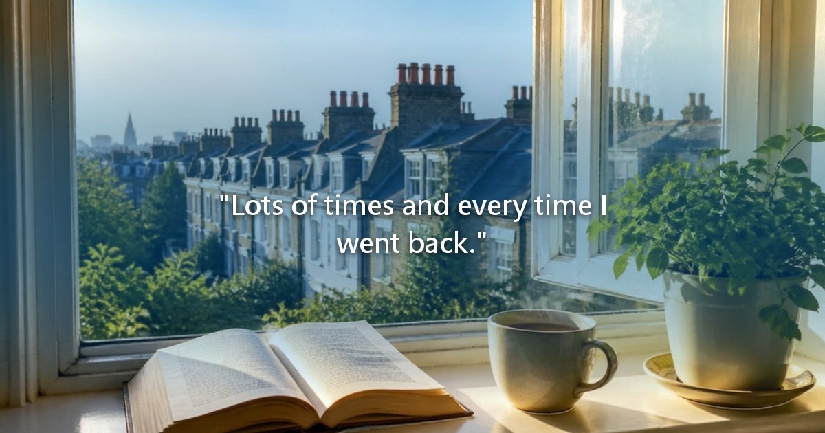 An open book and a cup of tea on a sunny windowsill, London rooftops and chimneys outside.